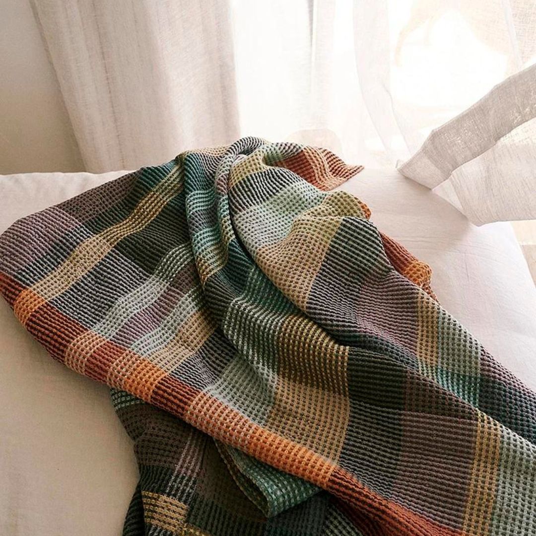 Mungo Vrou-Vrou Blanket in Cypress colour on bed Simple Beautiful Things