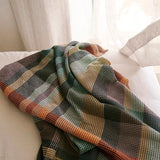 Mungo Vrou-Vrou Blanket in Cypress colour on bed Simple Beautiful Things