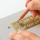 Traveler's Company Brass Template Bookmark Alphabet3_Simple_Beautiful_Things