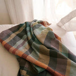 Mungo Vrou-Vrou Blanket in Cypress colour on bed Simple Beautiful Things
