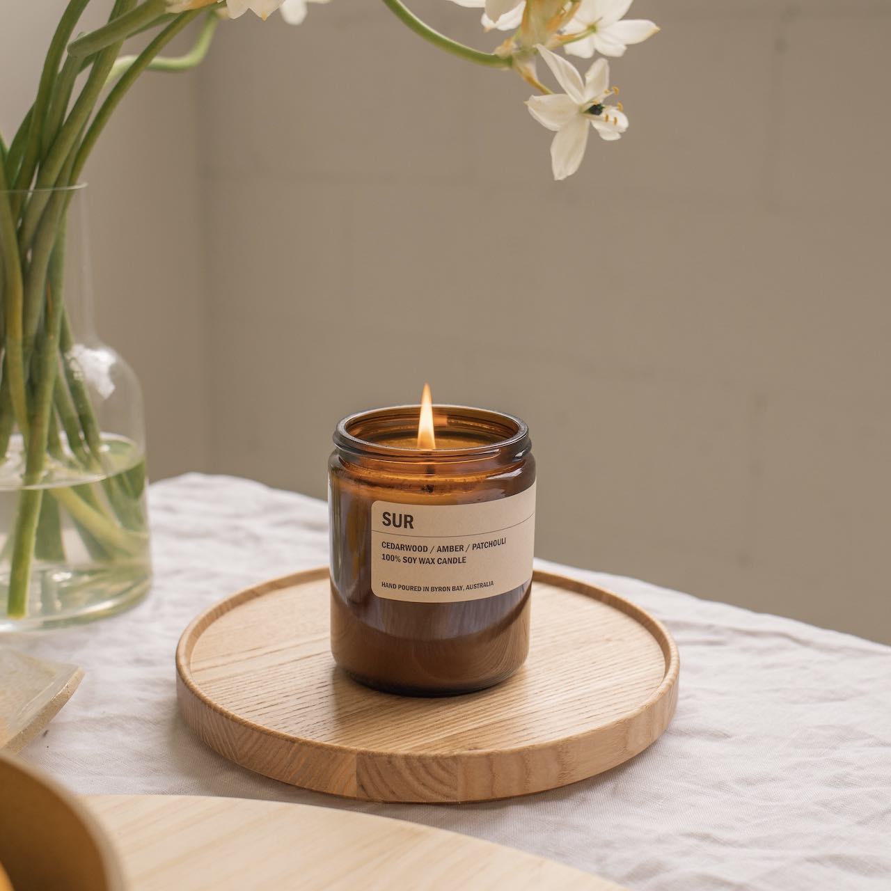 Sur Posie Candle on Hasami wooden plate at Simple Beautiful Things