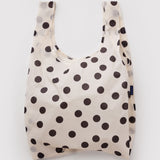 Standard Baggu Bag -  Black and Cream Polka Dot. Reusable shopping tote with cream background and black polka dot pattern.
