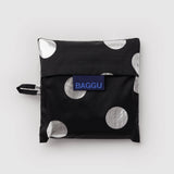 Standard Baggu Bag - Silver Metallic Polka Dot. Reusable shopping tote folded up in compact square case with 'BAGGU" logo tag.