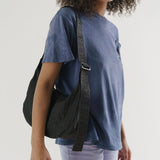 Baggu_Nylon_crossbody-bag-black-Crescent-on-shoulder-Simple_Beautiful_Things